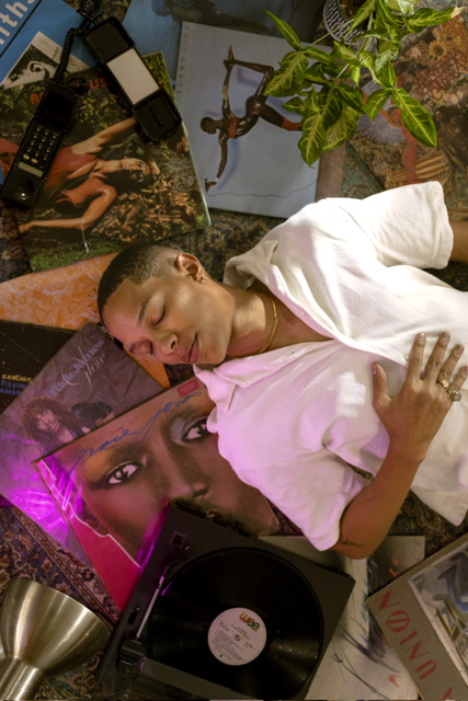 Sxdated lying on vinyl records and posters
